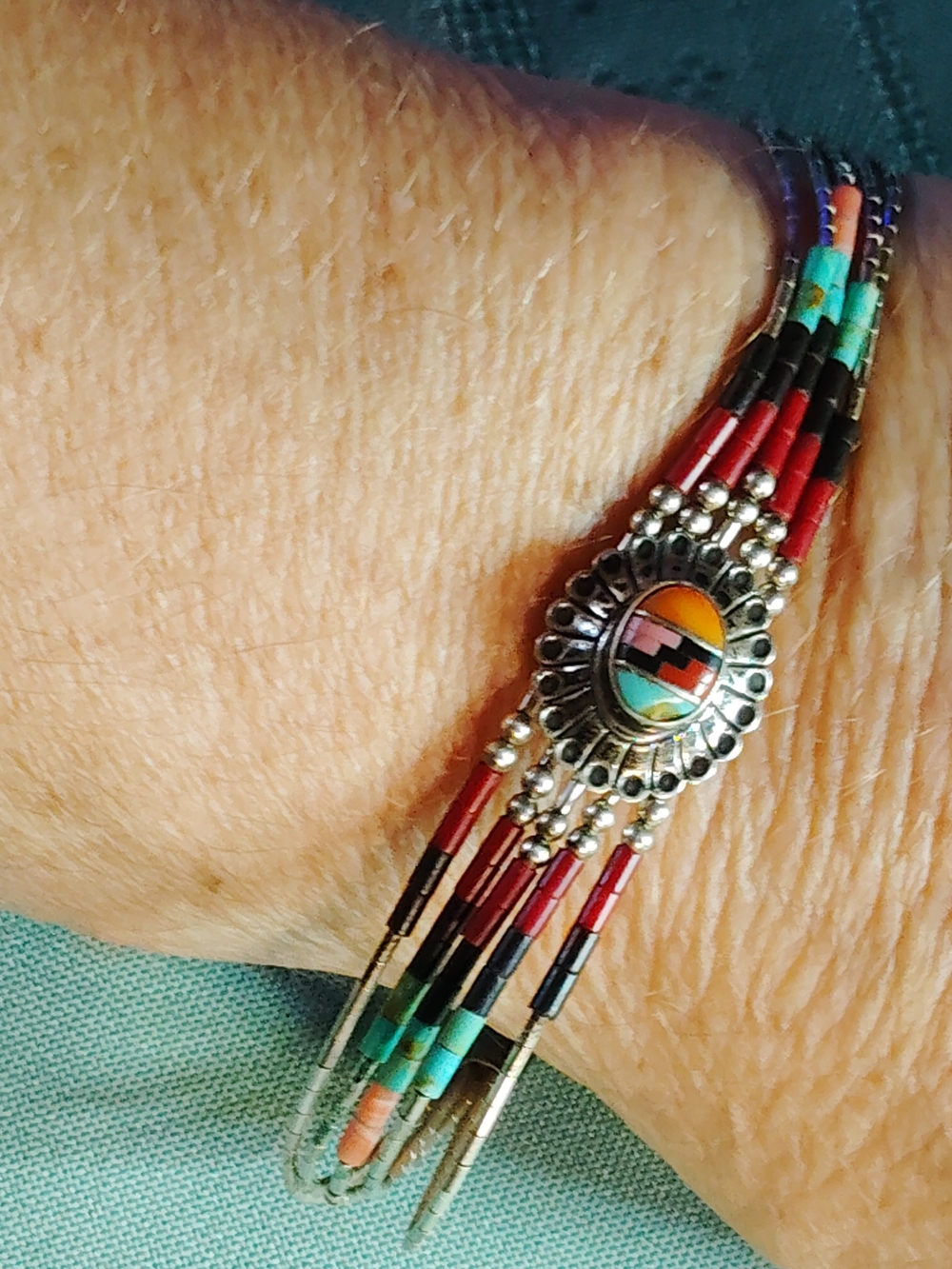 SOUTHWESTERN MULTI-PURPOSE BEADED, STERLING STRAND BRACELET. WITH CONCH ACCENT.